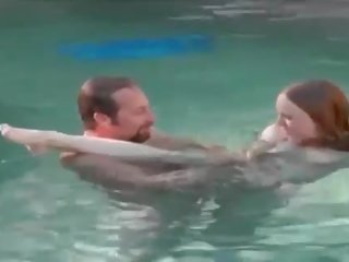 Redhead hottie eats johnson underwater for cash